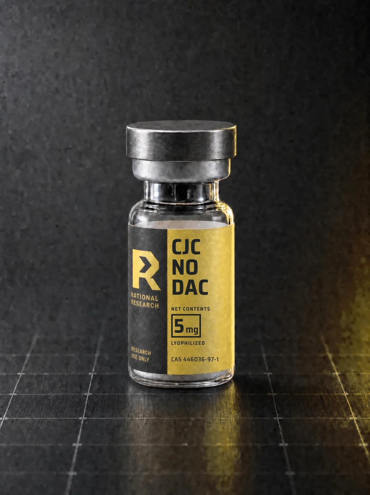 A sealed research vial carrying the printed Rational Research label for CJC no DAC, standing on a graphite panel